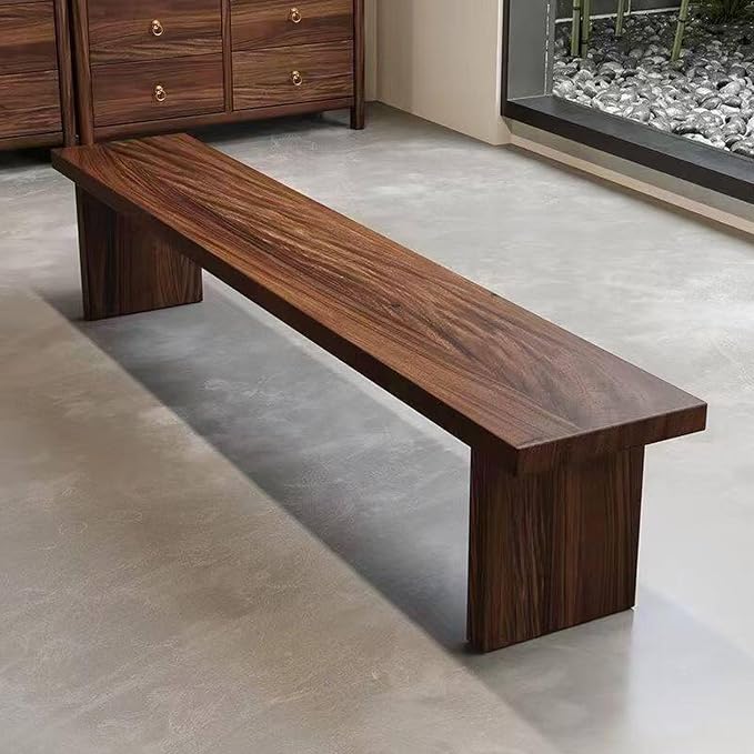 Dark wooden bench with broad panel legs
