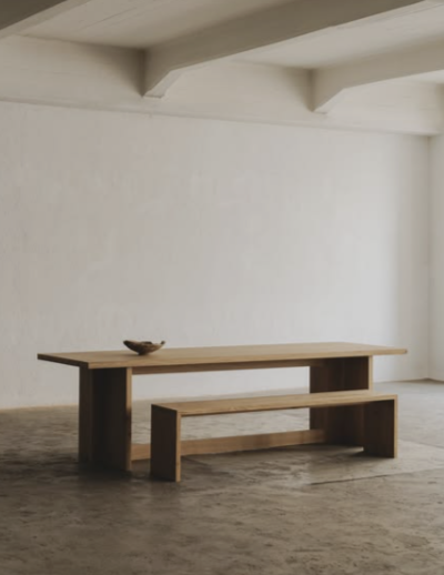 Wooden dining table and matching panel-leg bench