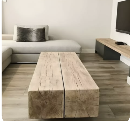 Low coffee table made from two substantial timber beams